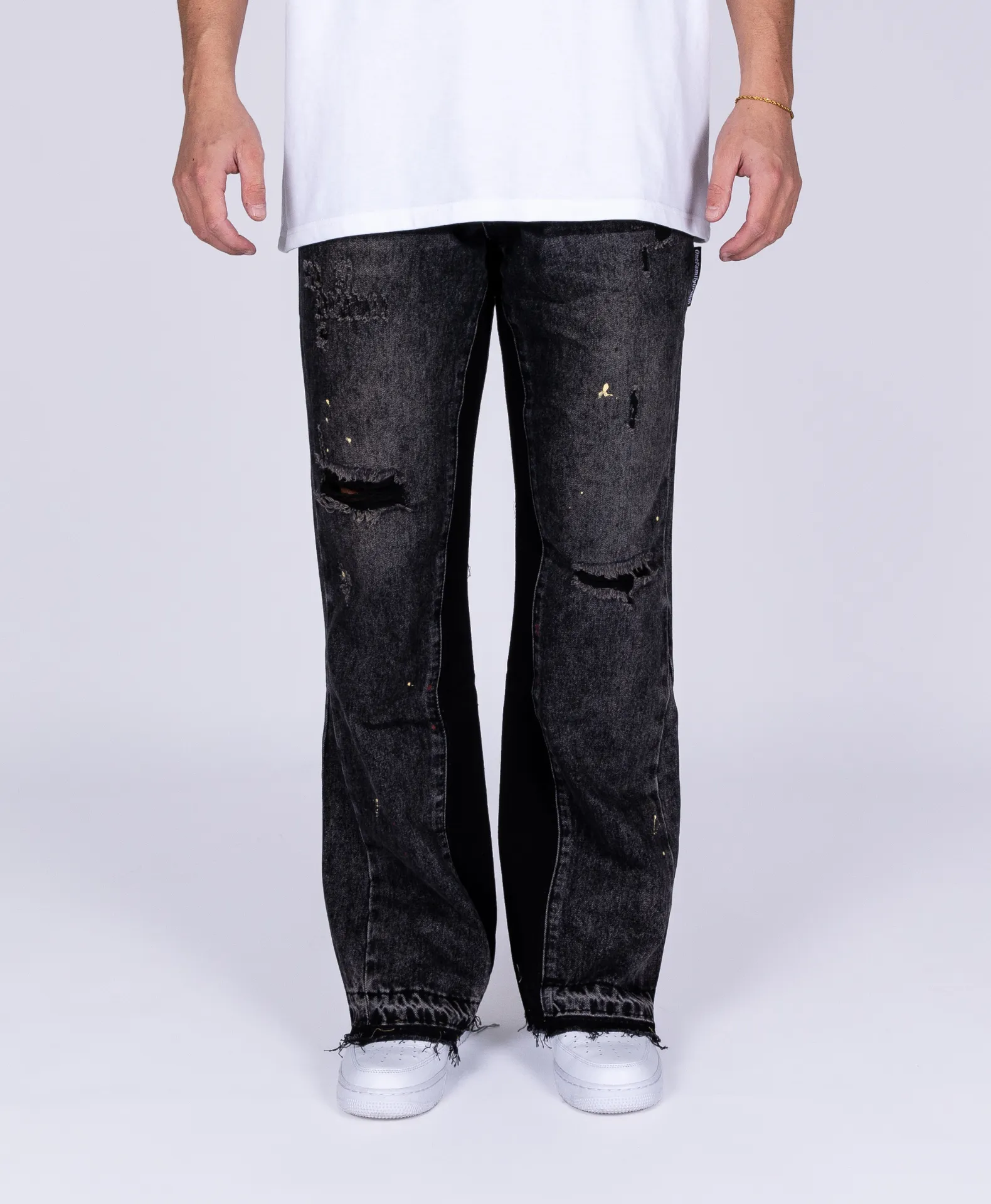 FLARED RIPPED JEANS BLACK